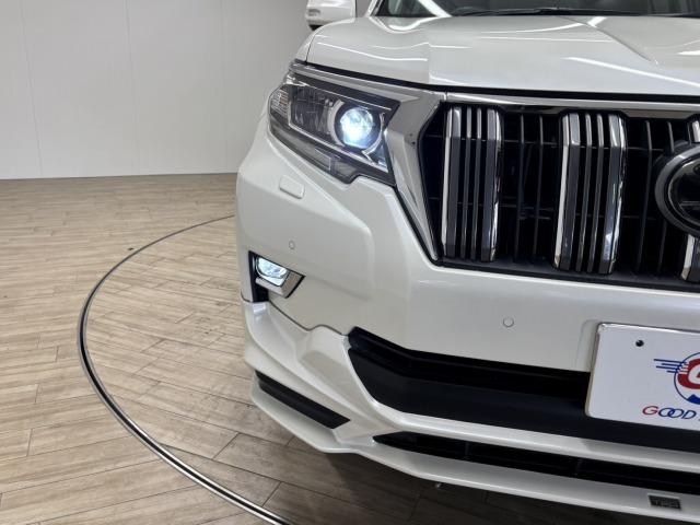 ランドクルーザープラド ＴＸ　Ｌパッケージ　ＴＲＤエアロ／サンルーフ／全周囲／ルーフレール／デルタフォース　オーバル１７インチＡＷ／黒革／純正９型ナビ地デジ／ダウンヒルアシスト／センターデフロック／ベンチレーション／追従クルコン／レーンキープ（72枚目）