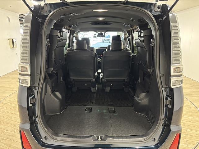 ヴォクシー ハイブリッドＺＳ　煌ＩＩＩ　純正１０インチナビ／地デジ／クルーズコントロール／レーンキープアシスト／衝突軽減ブレーキ／シートヒーター／両側電動スライド／ＬＥＤヘッドライト／オートハイビーム／ＥＴＣ／Ｗエアコン／バックカメラ（63枚目）