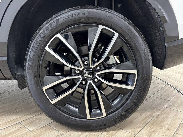 ヴェゼル ｅ：ＨＥＶ　Ｚ　純正９型ナビ地デジ／バックカメラ／追従クルコン／ホンダセンシング／シートヒーター／パワーバックドア／クリアランスソナー／ＢＳＭ／ＥＴＣ／ＬＥＤヘッドライト／スマートキー／ダウンヒルアシスト（65枚目）