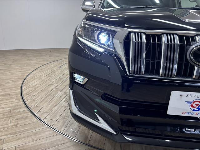 ランドクルーザープラド ＴＸ　Ｌパッケージ　モデリスタエアロ／ＯＰ１９インチＡＷ／ルーフレール／純正９インチナビ／バックカメラ／黒革／シートベンチレーション／パワーシート／追従クルコン／レーンキープアシスト／地デジ／ＬＥＤヘッドライト（72枚目）