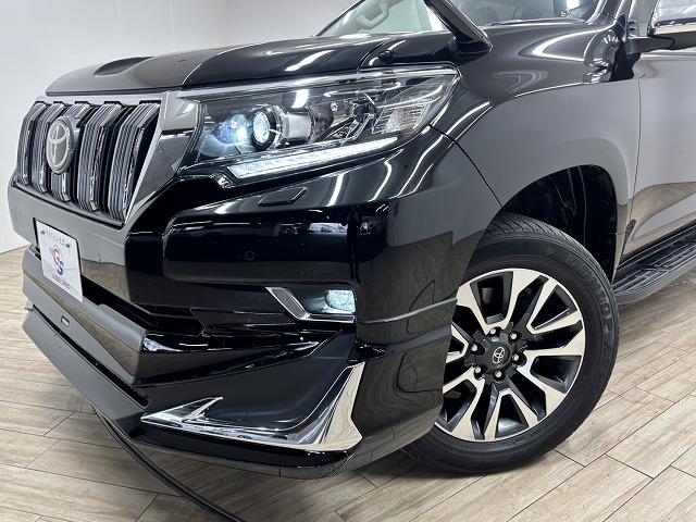 ランドクルーザープラド ＴＸ　Ｌパッケージ　モデリスタエアロ／ＯＰ１９インチＡＷ／ルーフレール／純正９インチナビ／バックカメラ／黒革／シートベンチレーション／パワーシート／追従クルコン／レーンキープアシスト／地デジ／ＬＥＤヘッドライト（74枚目）