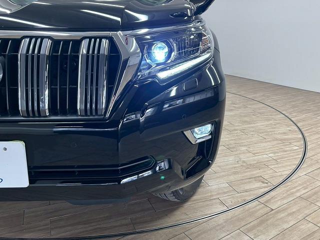 ランドクルーザープラド ＴＸ　Ｌパッケージ　７人乗り／サンルーフ／９型ナビ地デジ／バックカメラ／革シート／追従クルコン／パワーシート／シートベンチレーション／オートハイビーム／ＬＥＤヘッドライト／ＥＴＣ／スマートキー／オートエアコン（32枚目）