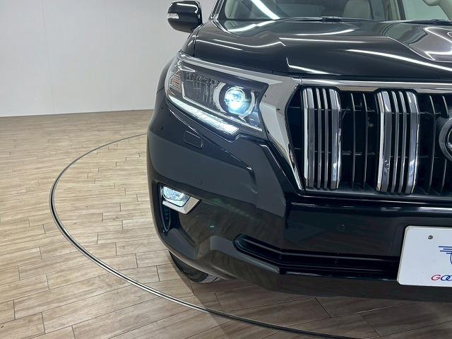 ランドクルーザープラド ＴＸ　Ｌパッケージ　７人乗り／サンルーフ／９型ナビ地デジ／バックカメラ／革シート／追従クルコン／パワーシート／シートベンチレーション／オートハイビーム／ＬＥＤヘッドライト／ＥＴＣ／スマートキー／オートエアコン（33枚目）