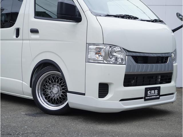 ハイエースバン DX GLパッケージ ハイエース/新車未登録/DX-GLPKG/GS2WD/3/6人乗り//DX-GLパッケージ/CRSカスタム/バットパネル/3インチローダウン/フロントリップVer4/ESSEXホイール/ENCM-18(9枚目)