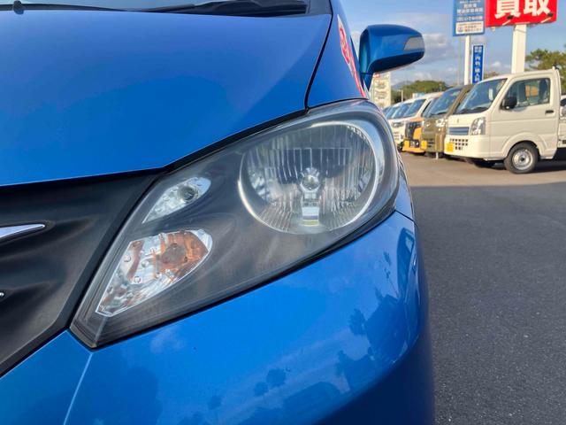 フリード Ｇ　ジャストセレクション　バックカメラ　ナビ　ＴＶ　両側スライド・片側電動　オートライト　ＨＩＤ　キーレスエントリー　電動格納ミラー　３列シート　ＣＶＴ　ＣＤ　ＤＶＤ再生　衝突安全ボディ　ＡＢＳ　エアコン　パワーステアリング（51枚目）