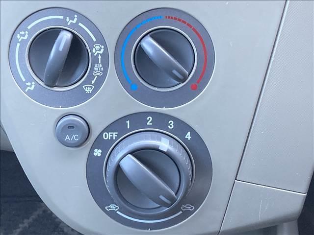 ミラ Ｌ　禁煙車　ダイハツ純正カーラジオ　ＣＤプレーヤー　ＥＴＣ　キーレス　横滑り防止装置　盗難防止装置　パワーステアリング　パワーウィンドウ　エアコン（6枚目）