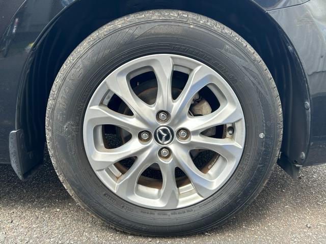 デミオ 13S Lパッケージ 禁煙車 マツダ純正ナビ Bluetooth CD DVD バックカメラ ETC アイドリングストップ 純正アルミ スマートキー 衝突軽減ブレーキ 横滑り防止装置 盗難防止装置 パワーステアリング(21枚目)