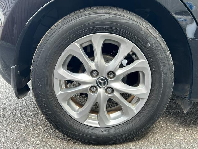 デミオ 13S Lパッケージ 禁煙車 マツダ純正ナビ Bluetooth CD DVD バックカメラ ETC アイドリングストップ 純正アルミ スマートキー 衝突軽減ブレーキ 横滑り防止装置 盗難防止装置 パワーステアリング(22枚目)