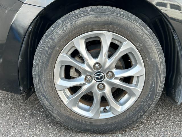 デミオ 13S Lパッケージ 禁煙車 マツダ純正ナビ Bluetooth CD DVD バックカメラ ETC アイドリングストップ 純正アルミ スマートキー 衝突軽減ブレーキ 横滑り防止装置 盗難防止装置 パワーステアリング(24枚目)
