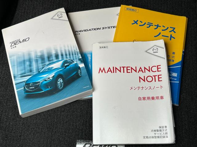 デミオ 13S Lパッケージ 禁煙車 マツダ純正ナビ Bluetooth CD DVD バックカメラ ETC アイドリングストップ 純正アルミ スマートキー 衝突軽減ブレーキ 横滑り防止装置 盗難防止装置 パワーステアリング(44枚目)
