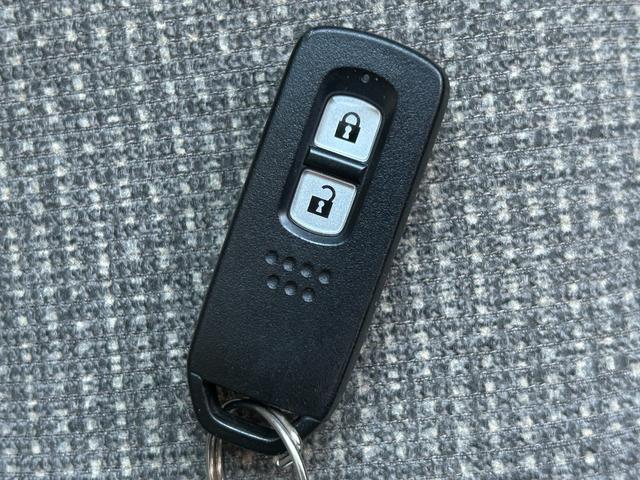 Ｎ－ＢＯＸ Ｇホンダセンシング　禁煙車　両側スライドドア　ホンダ純正ナビ　Ｂｌｕｅｔｏｏｔｈ　ＣＤ　バックカメラ　ＥＴＣ　クローズコントロール　スマートキー　衝突軽減ブレーキ　横滑り防止装置　障害物センサー　盗難防止装置（52枚目）