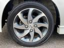 ハイウェイスターリミテッド　禁煙車　両側スライド片側電動ドア　社外ナビ　Ｂｌｕｅｔｏｏｔｈ接続　ワンセグＴＶ　ＣＤ　ＤＶＤ　オートマチックハイビーム　横滑り防止装置　盗難防止装置　フォグランプ　純正アルミ　スマートキー（24枚目）