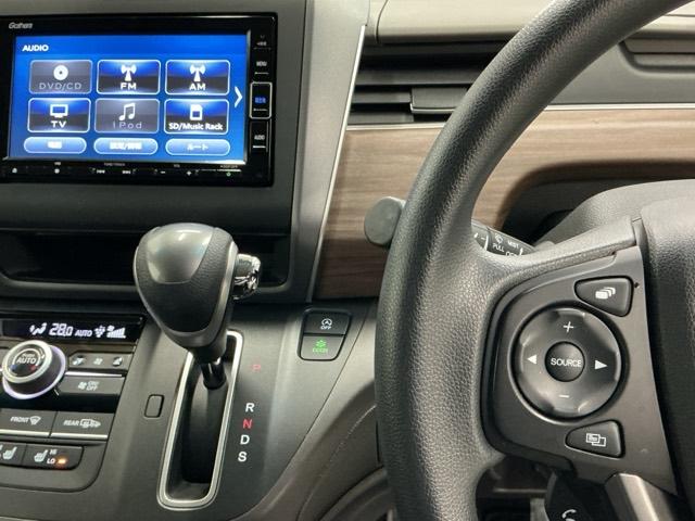 フリード Ｇ　ナビ　Ｒカメラ　ブルートゥース　フルセグ　Ａクルーズ　記録簿　３列シート　パワーウインドウ　地デジ　イモビ　ＶＳＡ　ＵＳＢ　エアコン　エアバッグ　スマートキー　ＥＣＯＮモード　シ－トヒ－タ－　キーフリ（3枚目）