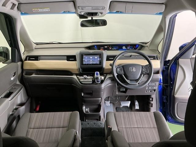 フリードハイブリッド ハイブリッド・Ｇホンダセンシング　ナビ　Ｒカメラ　ブルートゥース　フルセグ　クルーズＣ　ＤＶＤ視聴　ブレーキサポート　ＬＥＤヘットライト　Ｗエアバック　記録簿付き　バックモニタ　アイストップ　キーレス　ＥＴＣ付　横滑り防止機能　３列（2枚目）