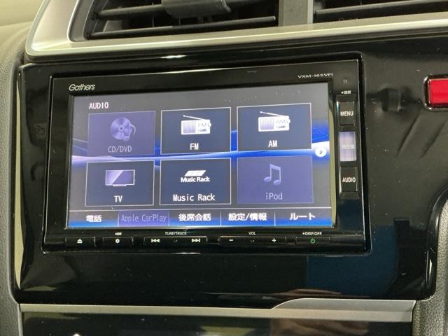 フィット １３Ｇ・Ｆパッケージコンフォートエディション　ナビ　Ｒカメラ　ブルートゥース　フルセグ　セキュリティアラーム　ＡＡＣ　整備記録簿　助手席エアバッグ　運転席エアバッグ　パワーウィンドウ　ＶＳＡ　シ－トヒ－タ－　キーレス　スマ－トキ－　ＡＢＳ（11枚目）