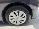 純正の１４インチホイールを装着しております。タイヤサイズは１５５／６５Ｒ１４です。フルホイールカバーを装着しています。