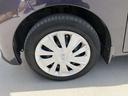 純正の１４インチホイールを装着しております。タイヤサイズは１５５／６５Ｒ１４です。フルホイールカバーを装着しています。