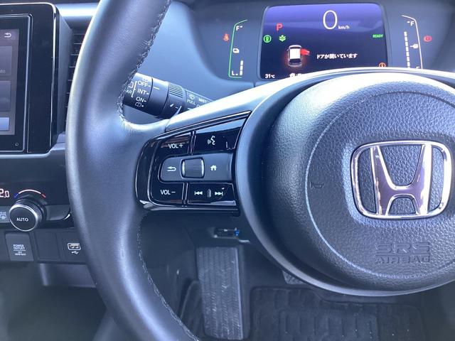 フィット ｅ：ＨＥＶホームブラックスタイル　当社デモカー・ディスプレイオーディオ／ＨＤＭＩ／ＵＳＢ／Ｂｌｕｅｔｏｏｔｈ接続・リアカメラ・前後ドラレコ・ＥＴＣ・ＬＥＤヘッドライト・衝突軽減ブレーキ・クルーズコントロール・スマートキー　Ｂカメラ（14枚目）