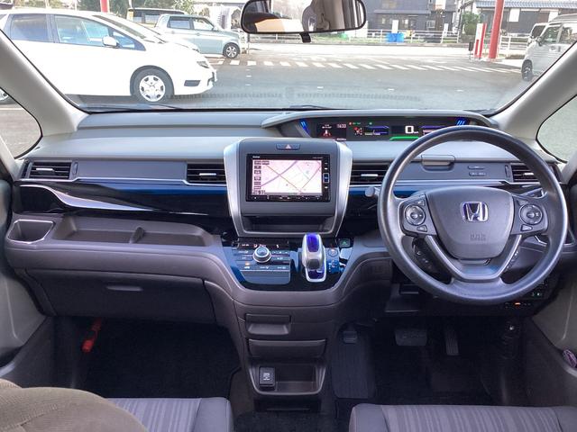 フリードハイブリッド ハイブリッド・Ｇホンダセンシング　ワンオーナー・７人乗り・ナビ・リアカメラ・ＬＥＤヘッドライト・衝突軽減ブレーキ・クルーズコントロール・スマートキー・ＥＴＣ・オートエアコン・　キーフリーシステム　１オ－ナ－　記録簿　ＤＶＤ再生可能（4枚目）