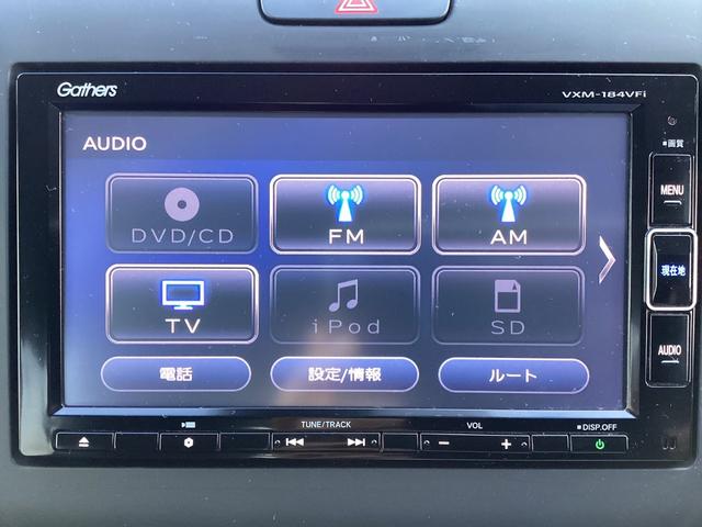 フリードハイブリッド ハイブリッド・Ｇホンダセンシング　ワンオーナー・７人乗り・ナビ・リアカメラ・ＬＥＤヘッドライト・衝突軽減ブレーキ・クルーズコントロール・スマートキー・ＥＴＣ・オートエアコン・　キーフリーシステム　１オ－ナ－　記録簿　ＤＶＤ再生可能（8枚目）