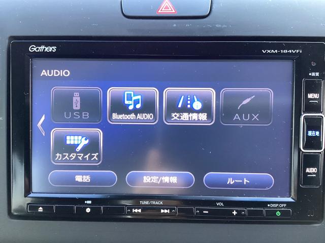 フリードハイブリッド ハイブリッド・Ｇホンダセンシング　ワンオーナー・７人乗り・ナビ・リアカメラ・ＬＥＤヘッドライト・衝突軽減ブレーキ・クルーズコントロール・スマートキー・ＥＴＣ・オートエアコン・　キーフリーシステム　１オ－ナ－　記録簿　ＤＶＤ再生可能（9枚目）