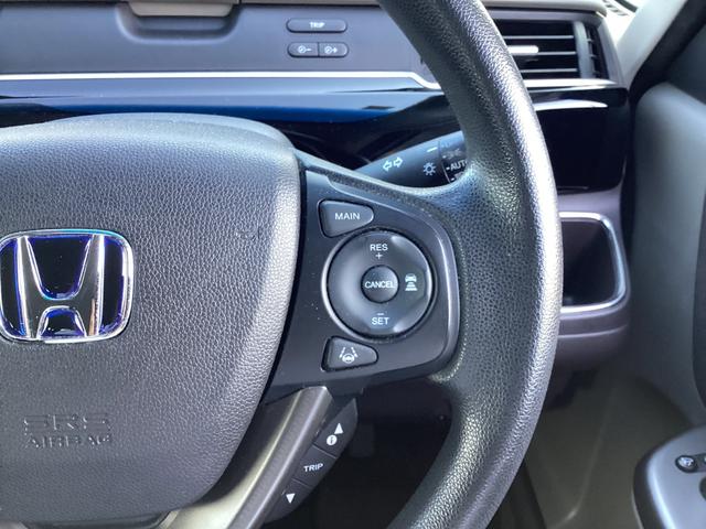 フリードハイブリッド ハイブリッド・Ｇホンダセンシング　ワンオーナー・７人乗り・ナビ・リアカメラ・ＬＥＤヘッドライト・衝突軽減ブレーキ・クルーズコントロール・スマートキー・ＥＴＣ・オートエアコン・　キーフリーシステム　１オ－ナ－　記録簿　ＤＶＤ再生可能（13枚目）