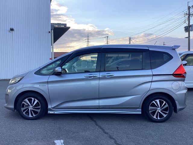 フリードハイブリッド ハイブリッド・Ｇホンダセンシング　ワンオーナー・７人乗り・ナビ・リアカメラ・ＬＥＤヘッドライト・衝突軽減ブレーキ・クルーズコントロール・スマートキー・ＥＴＣ・オートエアコン・　キーフリーシステム　１オ－ナ－　記録簿　ＤＶＤ再生可能（28枚目）