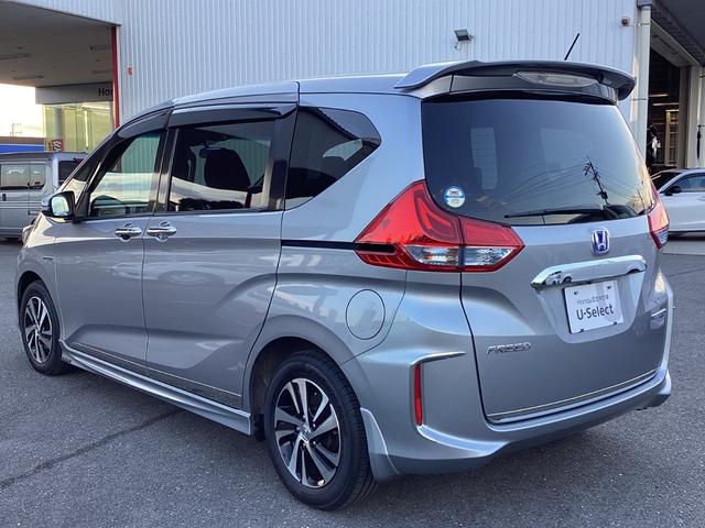 フリードハイブリッド ハイブリッド・Ｇホンダセンシング　ワンオーナー・７人乗り・ナビ・リアカメラ・ＬＥＤヘッドライト・衝突軽減ブレーキ・クルーズコントロール・スマートキー・ＥＴＣ・オートエアコン・　キーフリーシステム　１オ－ナ－　記録簿　ＤＶＤ再生可能（29枚目）