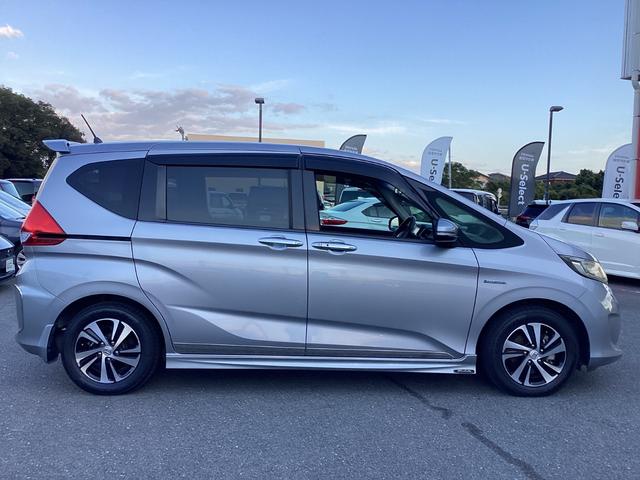 フリードハイブリッド ハイブリッド・Ｇホンダセンシング　ワンオーナー・７人乗り・ナビ・リアカメラ・ＬＥＤヘッドライト・衝突軽減ブレーキ・クルーズコントロール・スマートキー・ＥＴＣ・オートエアコン・　キーフリーシステム　１オ－ナ－　記録簿　ＤＶＤ再生可能（32枚目）