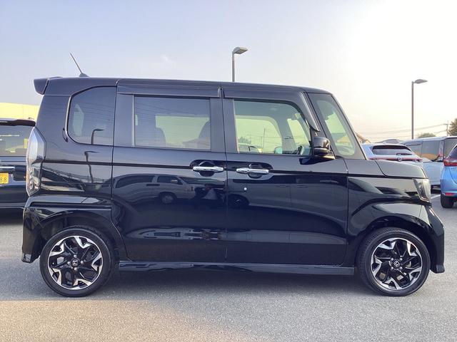 N-BOXカスタム G・Lターボホンダセンシング ナビゲーション ドライブレコーダー前後 ETC 両側パワースライドドア 運転席助手席シートヒーター オートリトラミラー フルオートエアコン クリアランスソナー 地デジ サイドカーテンエアバック VSA(4枚目)