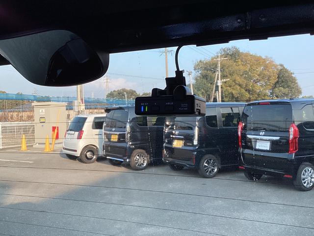 N-BOXカスタム G・Lターボホンダセンシング ナビゲーション ドライブレコーダー前後 ETC 両側パワースライドドア 運転席助手席シートヒーター オートリトラミラー フルオートエアコン クリアランスソナー 地デジ サイドカーテンエアバック VSA(28枚目)