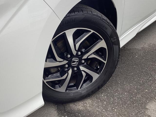 ステップワゴンスパーダ スパーダホンダセンシング　ナビゲーション　地デジ　リア席モニター　ＥＴＣ　両側パワースライドドア　２列目ベンチシート　フロントフルオートエアコン　リアマニュアルエアコン　１６インチアルミホイール　アクティブクルーズ　ＵＳＢ入力（35枚目）