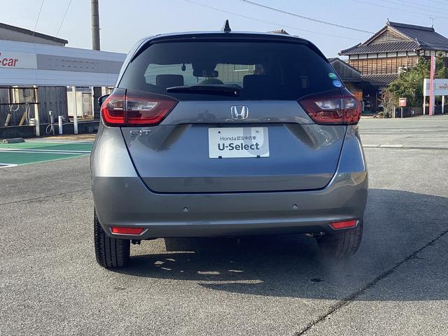 フィット ホーム　ナビゲーション　地デジ　ドラレコ前後　ＬＥＤヘッドライト　１６インチアルミホイール　電子パーキング　衝突軽減Ｂ　前後ソナー　横滑り防止装置　ＤＶＤ再生可　記録簿　アイドリングストップ　ＵＳＢ　キーレス（3枚目）