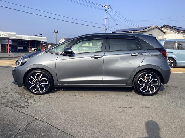 フィット ホーム　ナビゲーション　地デジ　ドラレコ前後　ＬＥＤヘッドライト　１６インチアルミホイール　電子パーキング　衝突軽減Ｂ　前後ソナー　横滑り防止装置　ＤＶＤ再生可　記録簿　アイドリングストップ　ＵＳＢ　キーレス（5枚目）