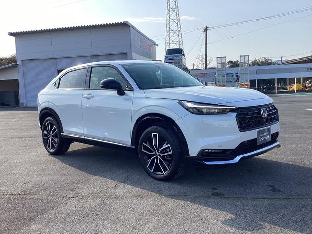 ヴェゼル ｅ：ＨＥＶＺ　ＨＯＮＤＡＣＯＮＮＥＣＴディスプレ－＋ＥＴＣ２．０＋ワイヤレス充電器　地デジ　運転席助手席シートヒーター　後退出庫サポート　ブラインドスポットインフォメーション　アダプティブドライビングビーム　イモビ（6枚目）