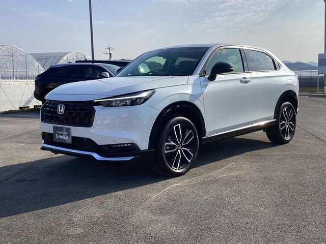 ヴェゼル ｅ：ＨＥＶＺ　ＨＯＮＤＡＣＯＮＮＥＣＴディスプレ－＋ＥＴＣ２．０＋ワイヤレス充電器　地デジ　運転席助手席シートヒーター　後退出庫サポート　ブラインドスポットインフォメーション　アダプティブドライビングビーム　イモビ（7枚目）