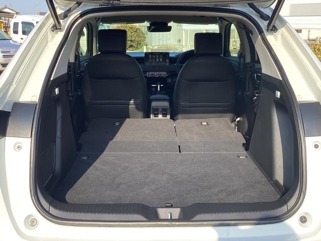 ヴェゼル ｅ：ＨＥＶＺ　ＨＯＮＤＡＣＯＮＮＥＣＴディスプレ－＋ＥＴＣ２．０＋ワイヤレス充電器　地デジ　運転席助手席シートヒーター　後退出庫サポート　ブラインドスポットインフォメーション　アダプティブドライビングビーム　イモビ（25枚目）