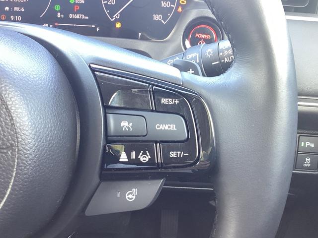 ヴェゼル ｅ：ＨＥＶＺ　ＨＯＮＤＡＣＯＮＮＥＣＴディスプレ－＋ＥＴＣ２．０＋ワイヤレス充電器　地デジ　運転席助手席シートヒーター　後退出庫サポート　ブラインドスポットインフォメーション　アダプティブドライビングビーム　イモビ（27枚目）