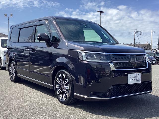 ステップワゴン e:HEVスパーダプレミアムライン ワンオーナー・11インチナビ・15インチルーフモニター・前後ドラレコ・マルチビューカメラ・パワーテールゲート・オットマンシート・BSI・オートエアコン・シートヒーター・ETC・取説・記録簿 Fセグ(3枚目)