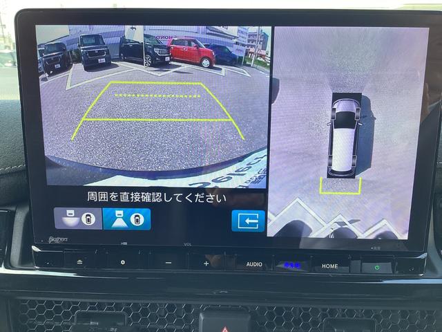 ステップワゴン e:HEVスパーダプレミアムライン ワンオーナー・11インチナビ・15インチルーフモニター・前後ドラレコ・マルチビューカメラ・パワーテールゲート・オットマンシート・BSI・オートエアコン・シートヒーター・ETC・取説・記録簿 Fセグ(6枚目)