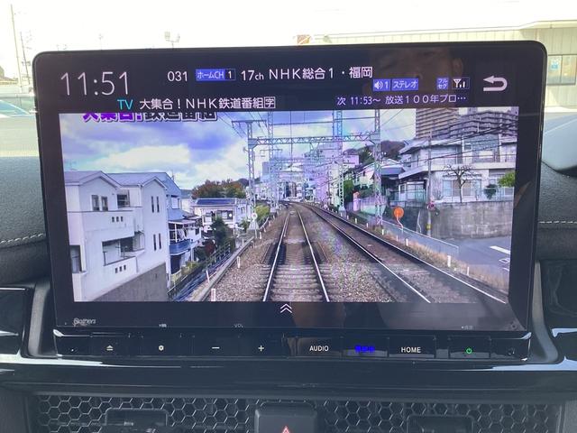 ステップワゴン e:HEVスパーダプレミアムライン ワンオーナー・11インチナビ・15インチルーフモニター・前後ドラレコ・マルチビューカメラ・パワーテールゲート・オットマンシート・BSI・オートエアコン・シートヒーター・ETC・取説・記録簿 Fセグ(8枚目)