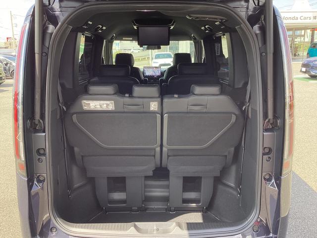 ステップワゴン e:HEVスパーダプレミアムライン ワンオーナー・11インチナビ・15インチルーフモニター・前後ドラレコ・マルチビューカメラ・パワーテールゲート・オットマンシート・BSI・オートエアコン・シートヒーター・ETC・取説・記録簿 Fセグ(27枚目)