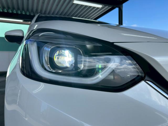 フィット ｅ：ＨＥＶネス　衝突軽減ブレーキ　車線維持支援　車速追従クルーズコントロール　ナビＴＶ　Ｂｌｕｅｔｏｏｔｈ　バックカメラ　クリアランスソナー　前後ドラレコ　スマートキー　ＥＴＣ　撥水シート　タイミングチェーン　禁煙車（10枚目）