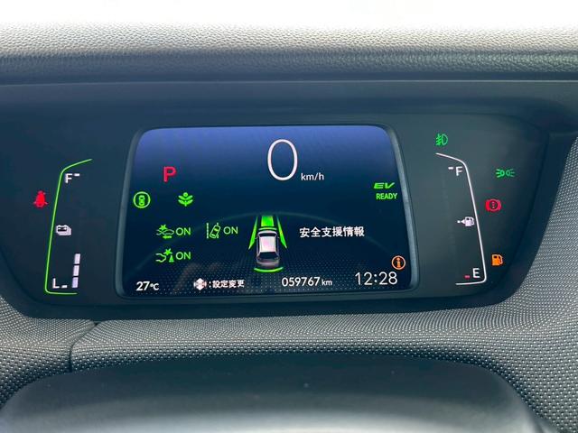 フィット ｅ：ＨＥＶネス　衝突軽減ブレーキ　車線維持支援　車速追従クルーズコントロール　ナビＴＶ　Ｂｌｕｅｔｏｏｔｈ　バックカメラ　クリアランスソナー　前後ドラレコ　スマートキー　ＥＴＣ　撥水シート　タイミングチェーン　禁煙車（24枚目）