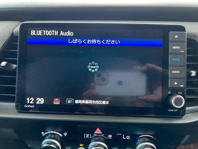 フィット ｅ：ＨＥＶネス　衝突軽減ブレーキ　車線維持支援　車速追従クルーズコントロール　ナビＴＶ　Ｂｌｕｅｔｏｏｔｈ　バックカメラ　クリアランスソナー　前後ドラレコ　スマートキー　ＥＴＣ　撥水シート　タイミングチェーン　禁煙車（27枚目）