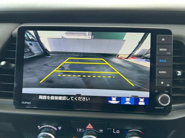 フィット ｅ：ＨＥＶネス　衝突軽減ブレーキ　車線維持支援　車速追従クルーズコントロール　ナビＴＶ　Ｂｌｕｅｔｏｏｔｈ　バックカメラ　クリアランスソナー　前後ドラレコ　スマートキー　ＥＴＣ　撥水シート　タイミングチェーン　禁煙車（28枚目）