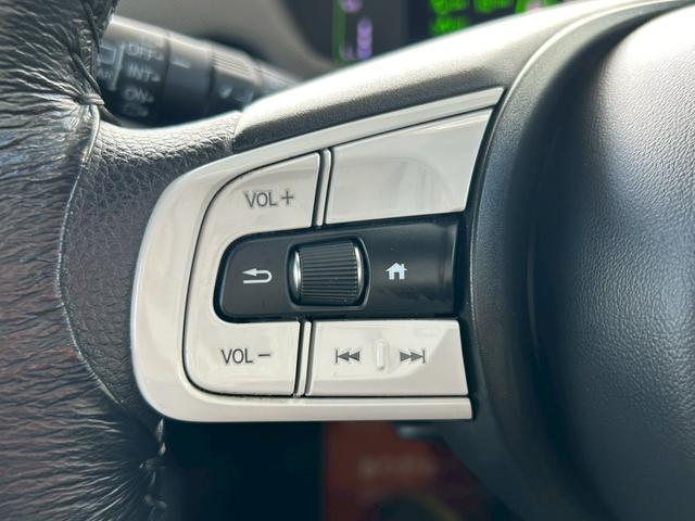 フィット ｅ：ＨＥＶネス　衝突軽減ブレーキ　車線維持支援　車速追従クルーズコントロール　ナビＴＶ　Ｂｌｕｅｔｏｏｔｈ　バックカメラ　クリアランスソナー　前後ドラレコ　スマートキー　ＥＴＣ　撥水シート　タイミングチェーン　禁煙車（29枚目）