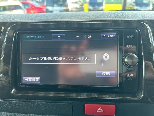 ハイエースバン スーパーＧＬ　ダークプライム　両側電動スライド　モデリスタフルエアロ　ナビ　フリップダウンモニター　５ＺＩＧＥＮ１５インチＡＷ　ＮＡＳＣＡＲホワイトレタータイヤ　Ｂｌｕｅｔｏｏｔｈ　バックカメラ　タイミングチェーン　ワンオーナー（27枚目）