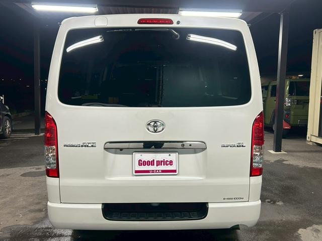 ハイエースバン スーパーＧＬ　ダークプライム　ベッドキット　両側電動スライド　ナビＴＶ　Ｂｌｕｅｔｏｏｔｈ　バックカメラ　スマートキー　ＥＴＣ　専用シート　純正１５インチＡＷ　ホワイトレタータイヤ　ＬＥＤヘッドライト　タイミングチェーン　禁煙車（5枚目）