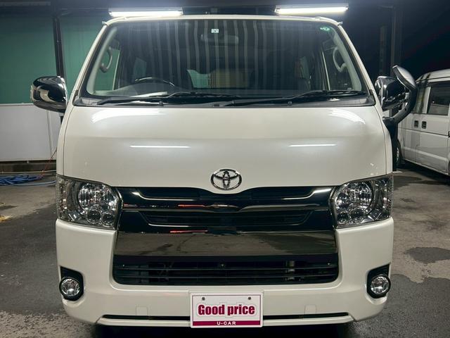 ハイエースバン スーパーＧＬ　ダークプライム　ベッドキット　両側電動スライド　ナビＴＶ　Ｂｌｕｅｔｏｏｔｈ　バックカメラ　スマートキー　ＥＴＣ　専用シート　純正１５インチＡＷ　ホワイトレタータイヤ　ＬＥＤヘッドライト　タイミングチェーン　禁煙車（9枚目）